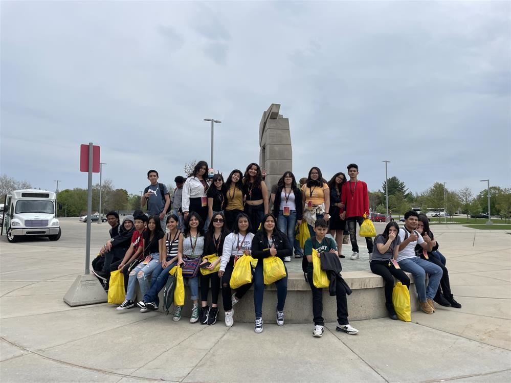  students posing on campus